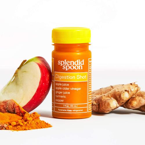 Digestion Shot surrounded by its ingredients