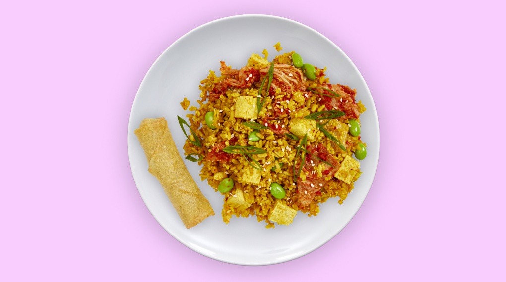 Kimchi Fried Quinoa on a white plate as seen from above