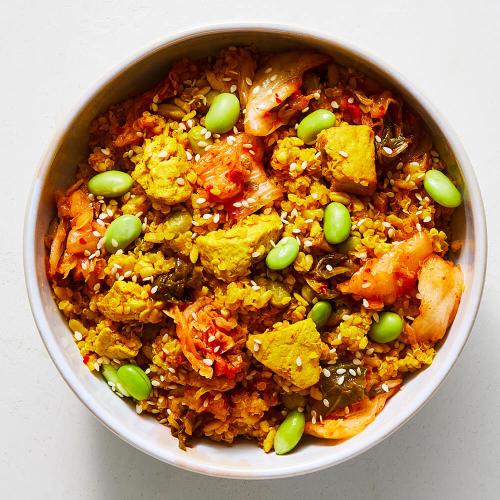 Kimchi Fried Quinoa Bowl on a white background