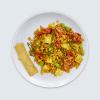 Kimchi Fried Quinoa as seen from above in a while bowl on a white background.