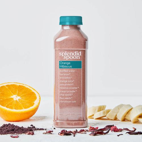 Bottle of Orange Hibiscus with orange, bananas, maqui powder, and hibiscus. 