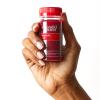 Hand holding an Immunity Shot