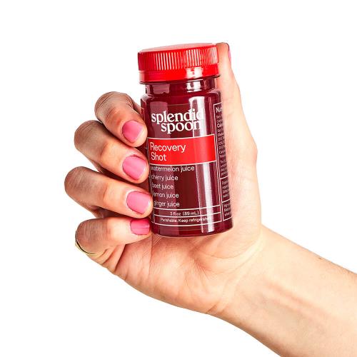 Hand holding Recovery Shot