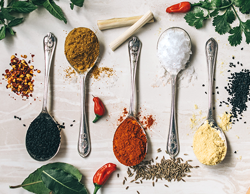 Different spices on spoons