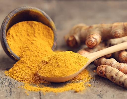 Turmeric powder on a spoon